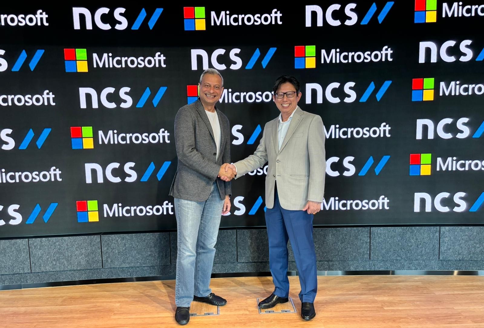Ng Kuo Pin, Chief Executive Officer, NCS (right) and Ahmed Mazhari, President, Microsoft Asia launching the expanded collaboration to accelerate innovation, create new Intellectual Property and solutions for client