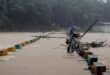 Floods, mudslides kill 2 in southwest China, destroy homes, bridge